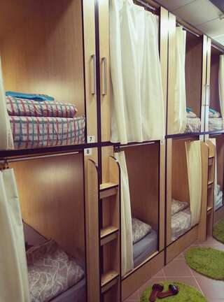 Хостелы Flatcom Hostel Минск Капсула в общем номере для мужчин и женщин-2
